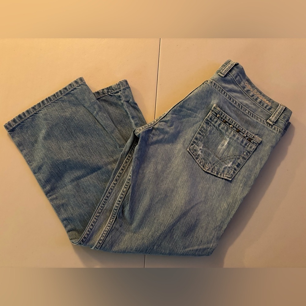 D&G Dolce & Gabbana | women’s distressed Zigzag cropped jeans.